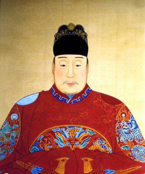 A formal court portrait painting of the Wanli Emperor of the Ming Dynasty, shown seated in imperial robes and headdress. He reigned from 1572 to 1620, overseeing Zhang Juzheng's Single Whip Reform, the Imjin War intervention in Korea, and the fiscal crisis that contributed to the dynasty's eventual collapse in 1644.